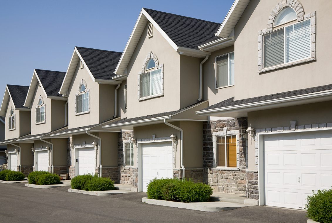 Townhouse complex with a tidy shared driveway