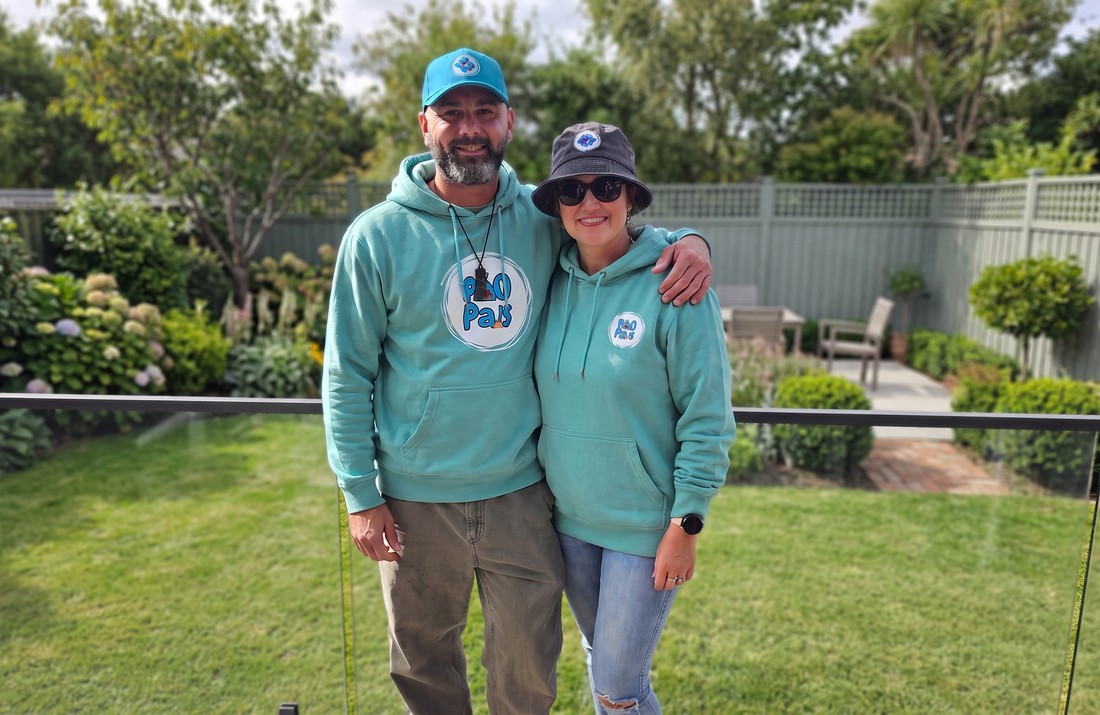 Stu and Mitch, the founders of PooPals, in their backyard
